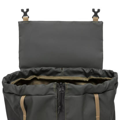 An open olive green drawstring backpack shown from above, revealing a gray interior lining, multiple zippered compartments, and a brown-and-orange patterned drawstring cord.