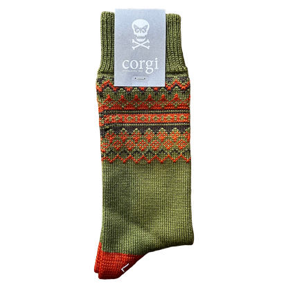 A single knit sock in olive green with a red and orange geometric pattern band and a red toe, shown on a white background with a gray paper tag that reads corgi.
