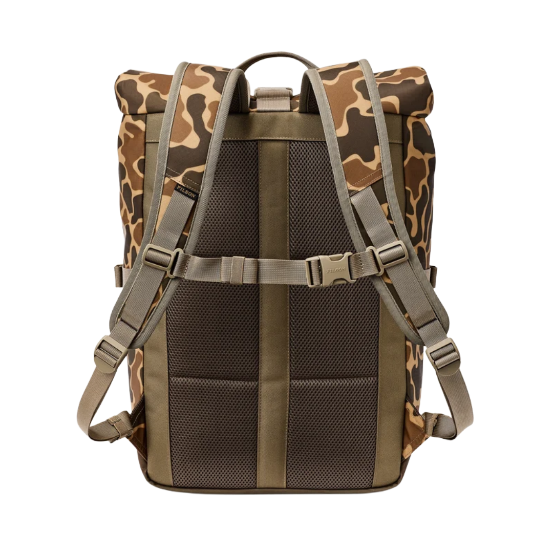A roll-top backpack shown from the back, featuring a brown and beige camouflage pattern on the top and sides, olive green webbing straps, and dark brown mesh ventilation panels on the back.
