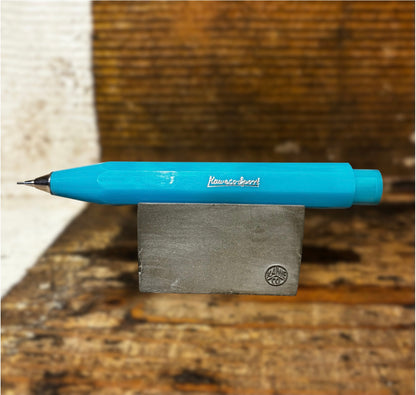 Light Blue Kaweco Pen on wooden block on wooden background Men's accessories