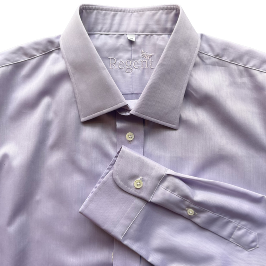 A lavender-colored long-sleeve dress shirt with a pointed collar and a folded cuff, shown on a plain white background. The brand name 'The Regent' is embroidered on the inner neck label.