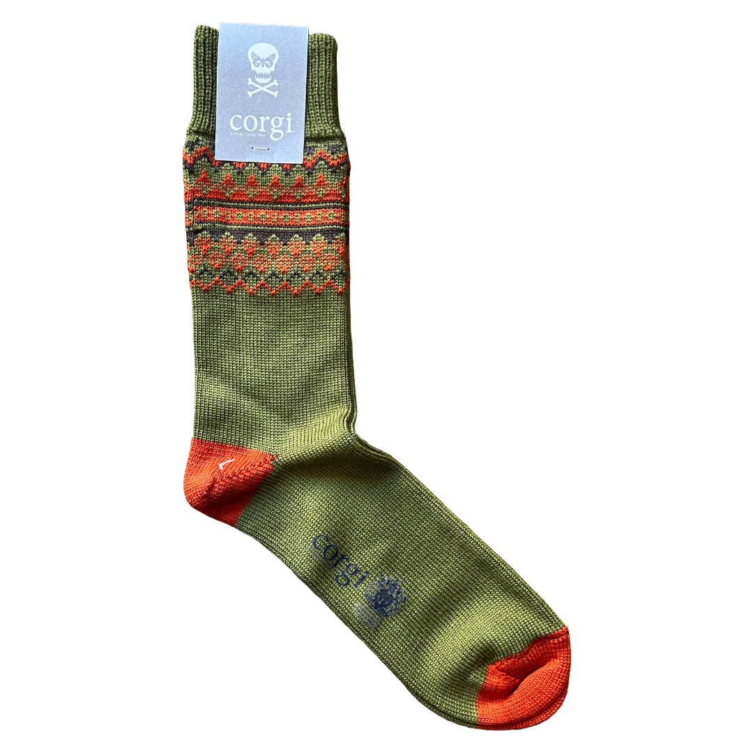 A single corgi-themed crew sock in olive green with orange and red patterned bands, orange heel and toe, and a light blue brand tag at the cuff, shown on a plain white background.