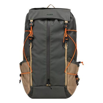A dark gray roll-top backpack with tan mesh side pockets and bright orange compression straps, shown on a solid white background.