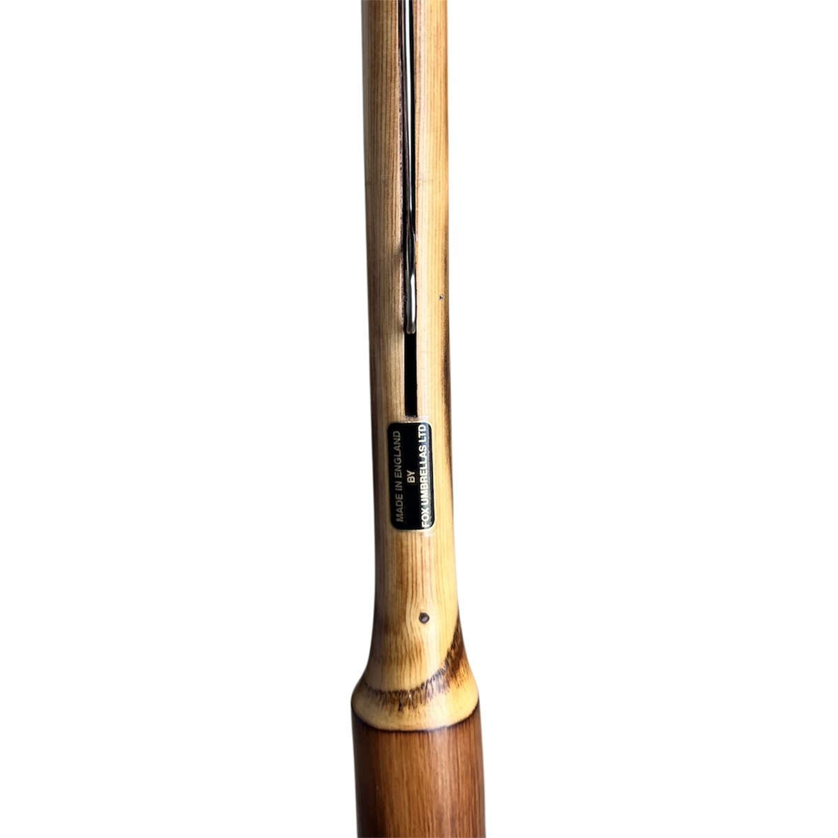 Brown wooden umbrella handle saying made in England by fox umbrella ltd