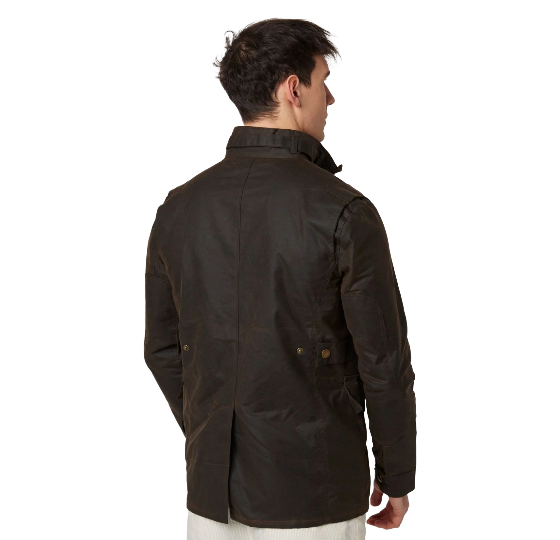 A man wearing a dark brown waxed cotton jacket, shown from the back, on a solid white background.