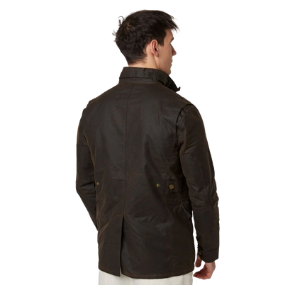 A man wearing a dark brown waxed cotton jacket, shown from the back, on a solid white background.