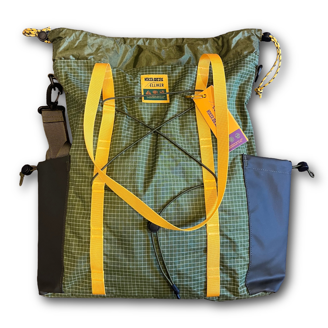 back of Eliker Green and yellow backpack with 2 water bottle pouches sold at regent in salisbury