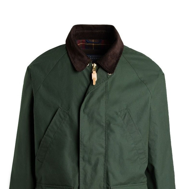 green waxed canvas jacket with velvet cord collar and 4 front pockets. 