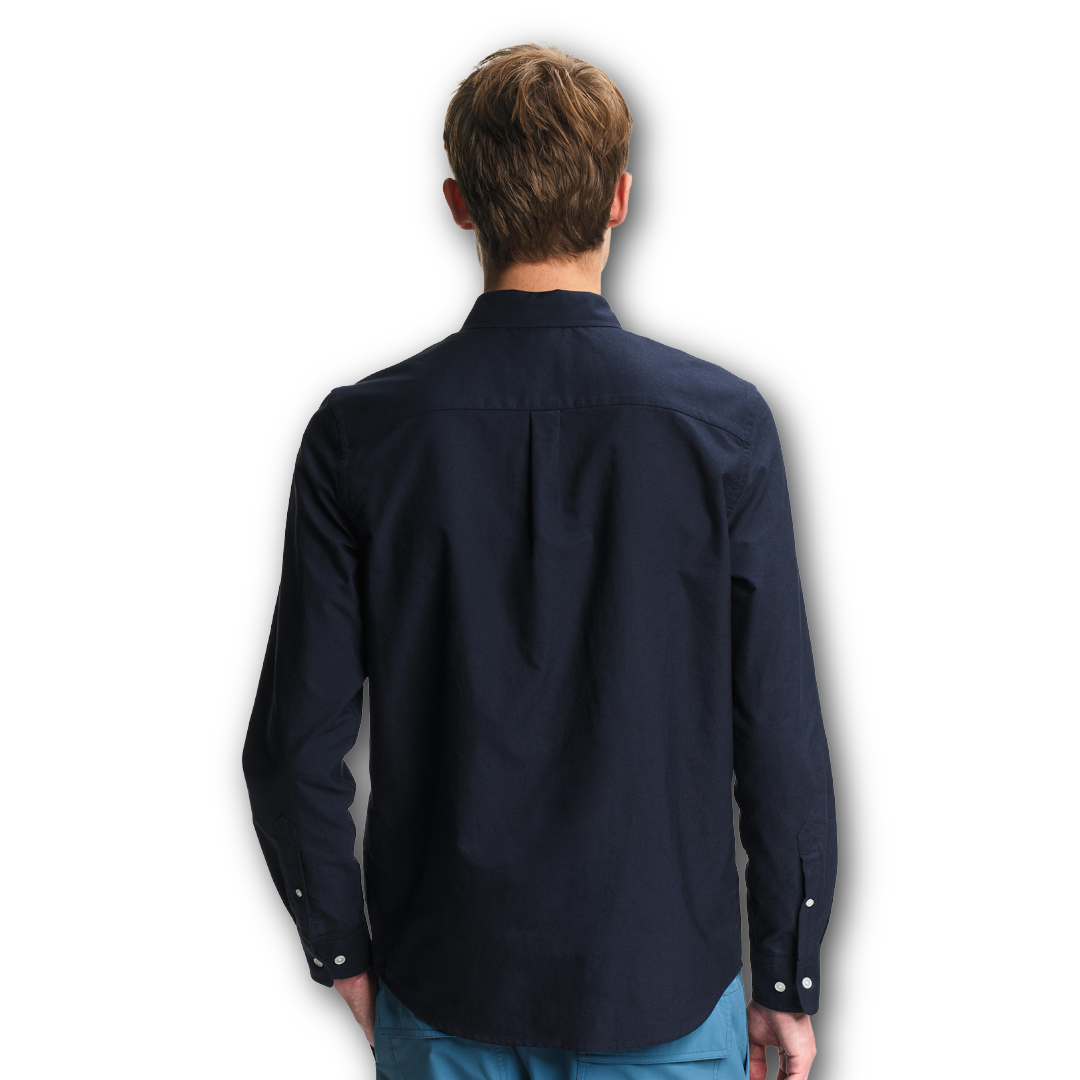 Back of person wearing Navy Dry Fast Aigle Oxford shirt sold at Regent