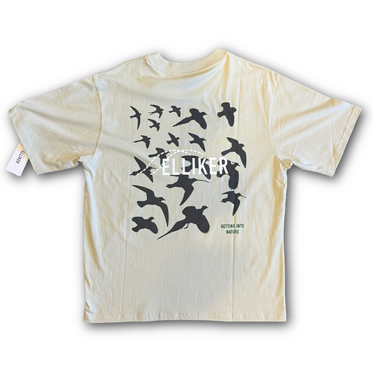 Back of Beige t-shirt Elliker with black bird graphic and 'FELICIA' branding on a white background