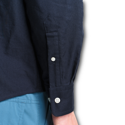 Close up of sleeve of navy Aigle oxford shirt sold at Regent in Salisbury