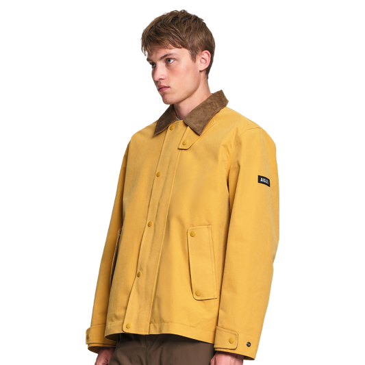 Aigle Water-Repellent Field Jacket in Honey with a contrasting corduroy collar, relaxed fit, lightweight lining and practical pocket detailing.