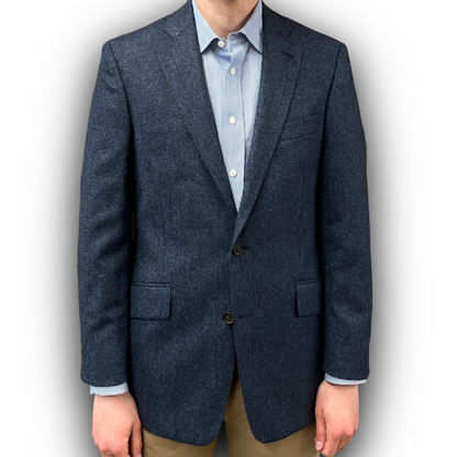 Navy and blue twees blazer worn by a person on a white background