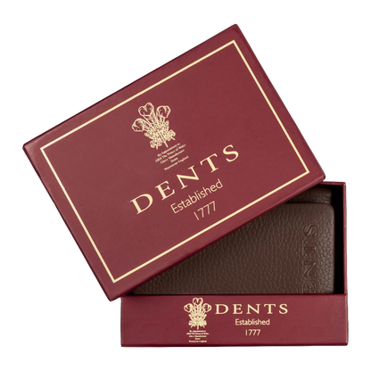A dark brown textured leather wallet presented in a burgundy Dents brand gift box with gold foil lettering, shown on a clean white background.