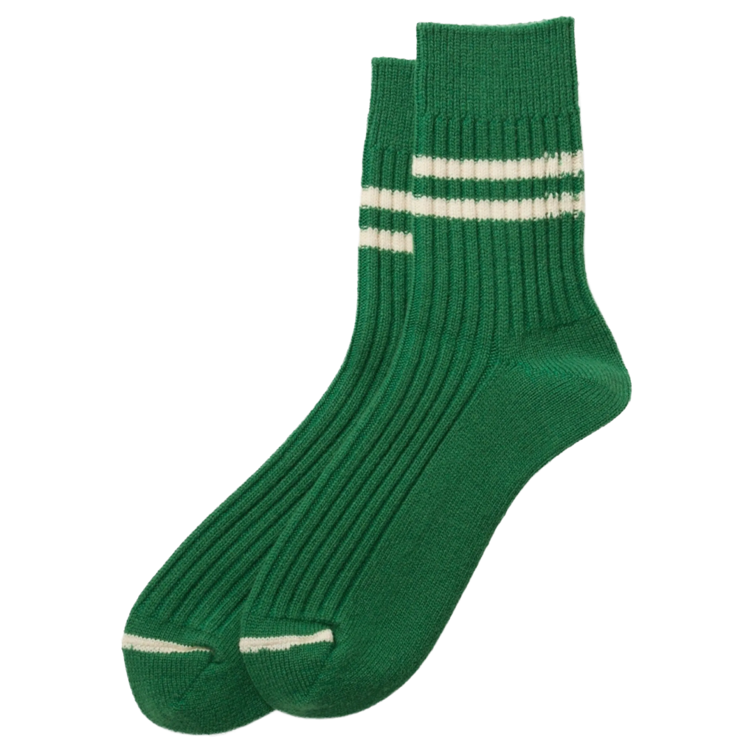 A pair of green ribbed crew socks with two horizontal cream stripes near the cuff and a matching cream stripe on the toe, shown on a plain white background.