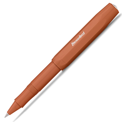 A pen in a warm terracotta brown color, shown diagonally on a clean white background with a soft drop shadow.