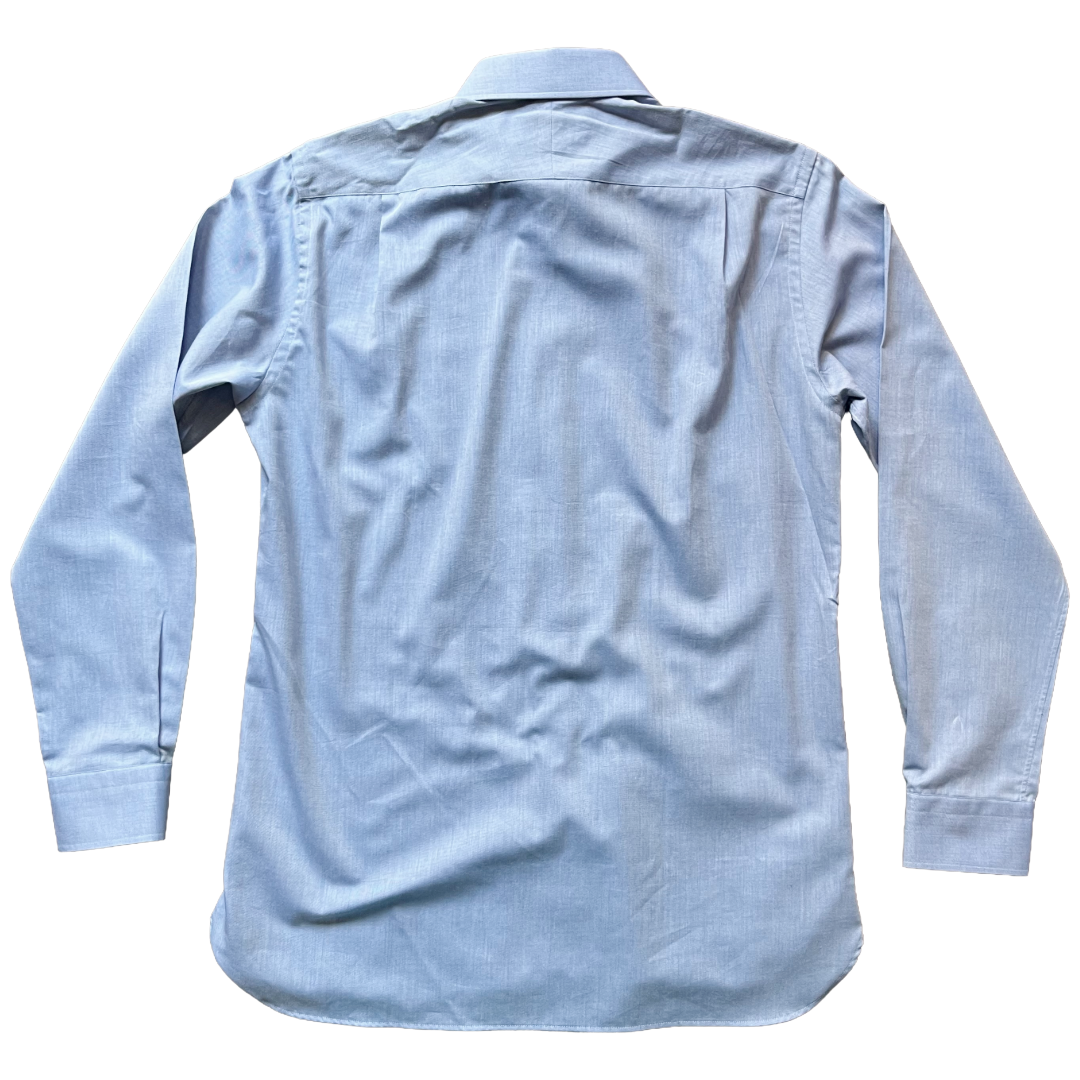A light blue long-sleeve button-down shirt shown from the back, laid flat against a solid white background.