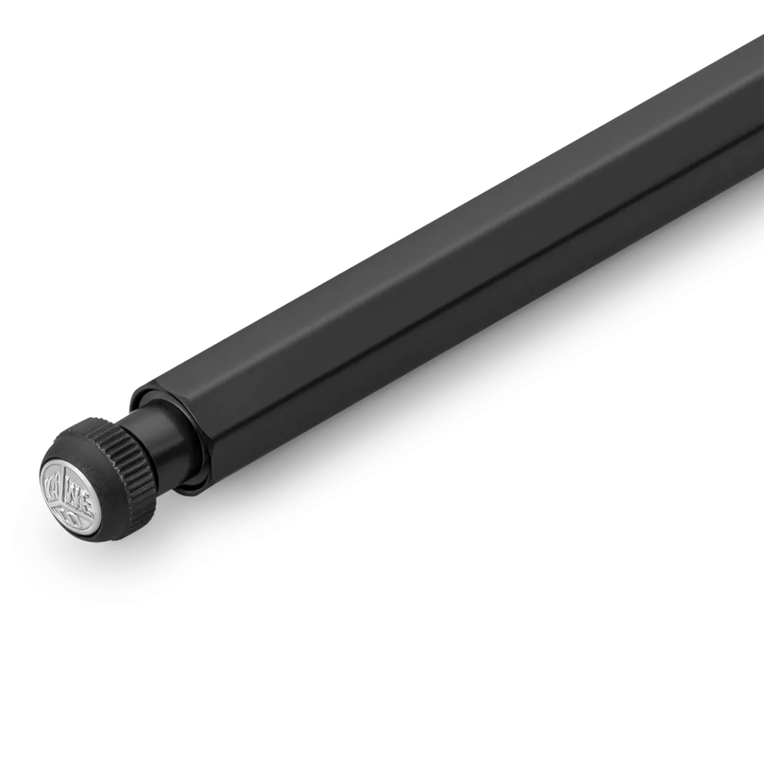 A close-up of a black metal pen with a knurled adjustment knob at one end, photographed on a clean white background.