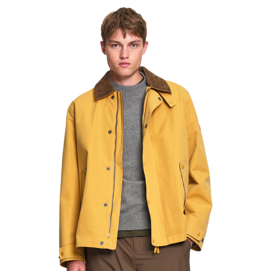 Aigle Water-Repellent Field Jacket in Honey with a contrasting corduroy collar, relaxed fit, lightweight lining and practical pocket detailing.