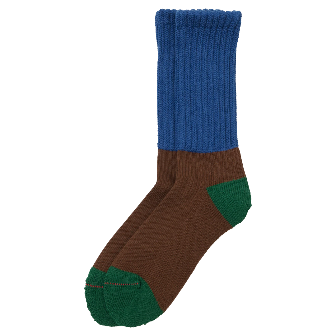 A pair of crew socks with a blue ribbed cuff, brown body, and green toe and heel accents, shown on a plain white background.