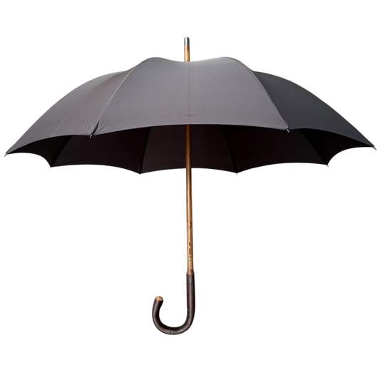 A classic open umbrella with a dark gray canopy, black underside, a light wood shaft, and a dark brown curved handle, shown against a plain white background.