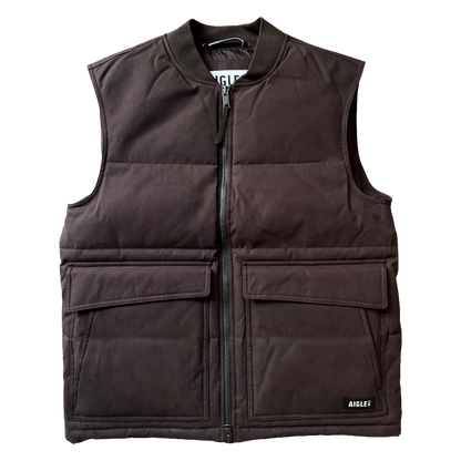 A dark brown sleeveless puffer vest with a front zipper, ribbed collar, and two large front flap pockets, shown flat against a white background.