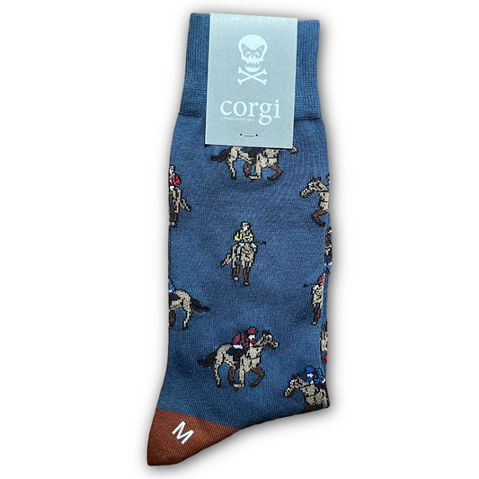 Blue sock with horse and rider pattern, brand 'corgi' visible! Sold in Salisbury by regent tailoring