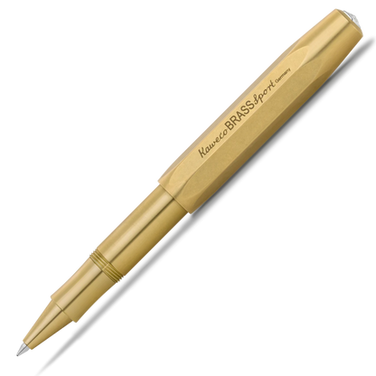 A metallic gold ballpoint pen with a faceted grip design, featuring the engraved text 'Kaneco BRASSsport Germany' on the barrel, shown against a plain white background with a soft shadow.