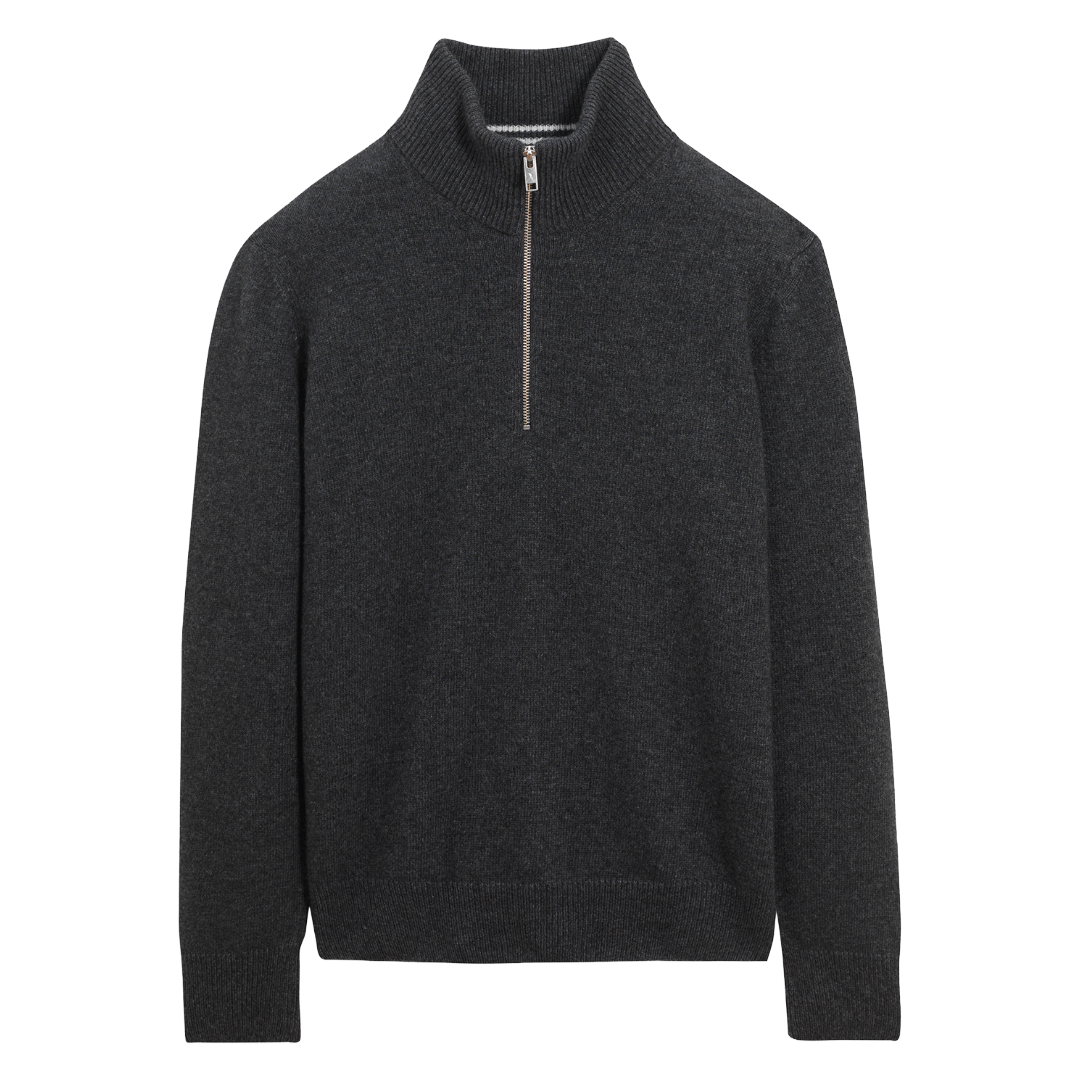 A dark charcoal gray half-zip knit sweater with a ribbed mock neck collar, long sleeves, and a ribbed hem, shown against a plain white background.