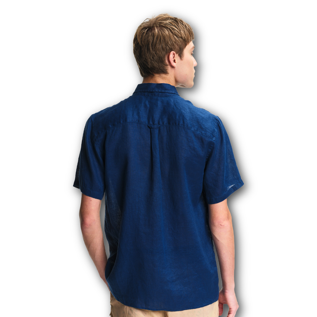 Back of person wearing blue Aigle shirt on a white background sold at Regent in Salisbury