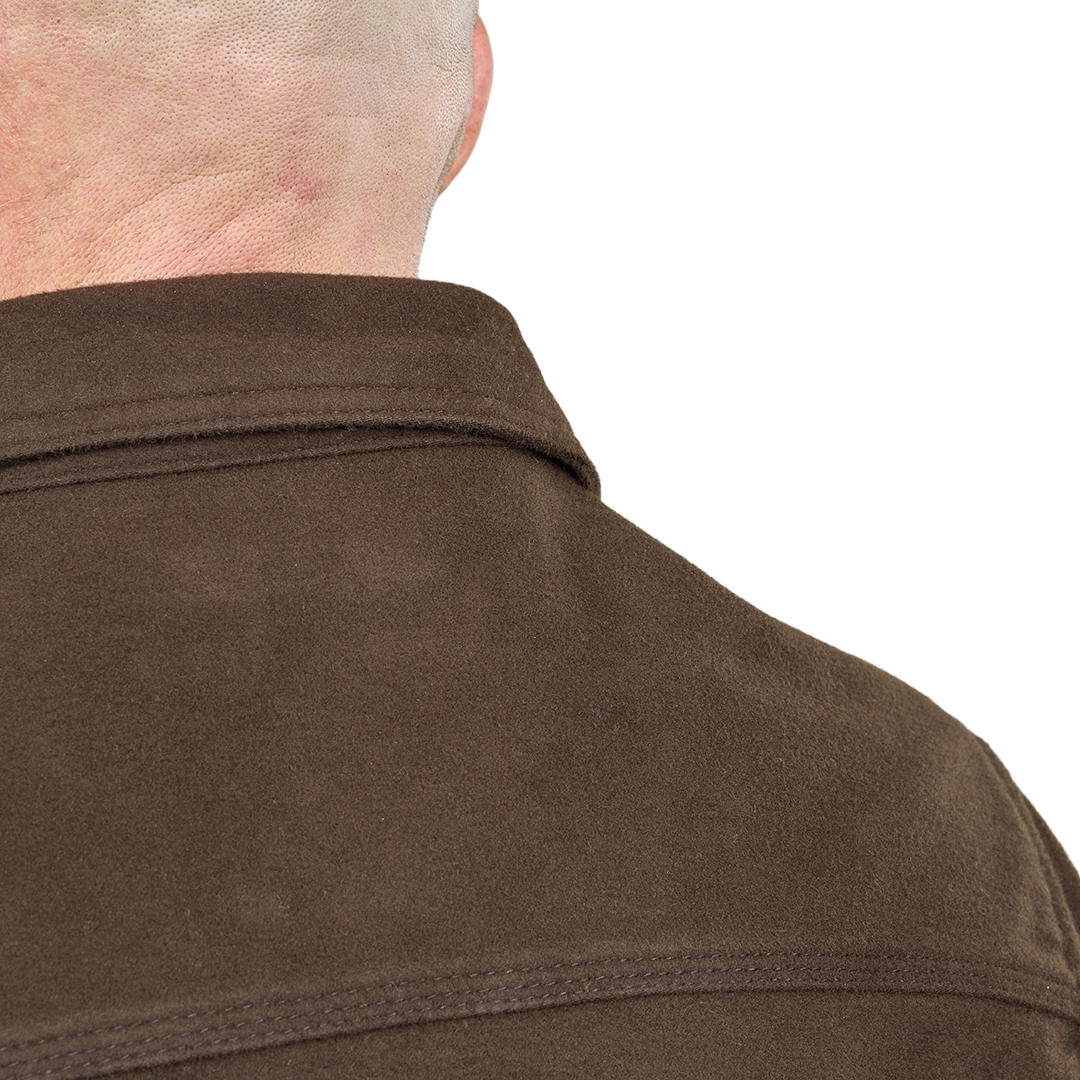 Close-up of the back of a person wearing a dark brown suede or nubuck overshirt, showing the collar, shoulder, and back of the neck against a plain white background.