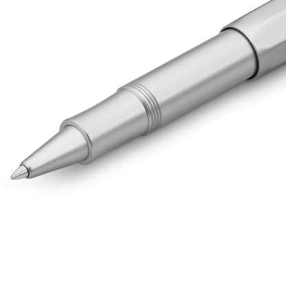 A close-up of a metallic silver ballpoint pen with a satin finish, featuring a ridged grip section and a sleek pointed tip, set against a clean white background.