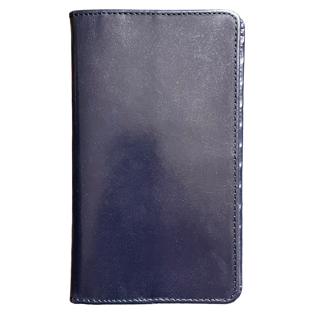 A dark navy blue leather wallet or folio case with visible stitching along the edges, shown against a plain white background.