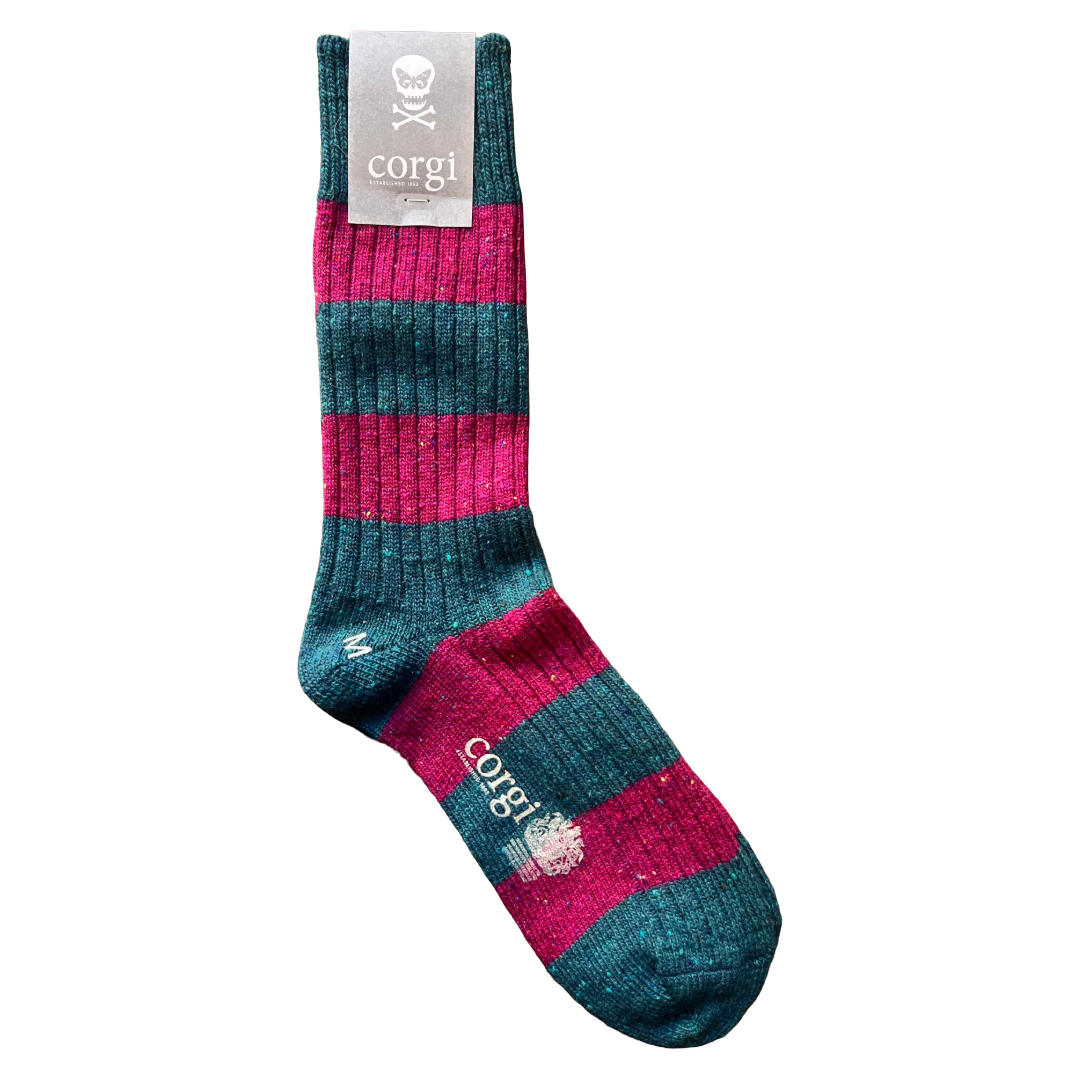 A single ribbed knit sock with horizontal stripes in teal and bright pink, featuring a gray brand tag at the cuff and 'corgi' printed on the foot.