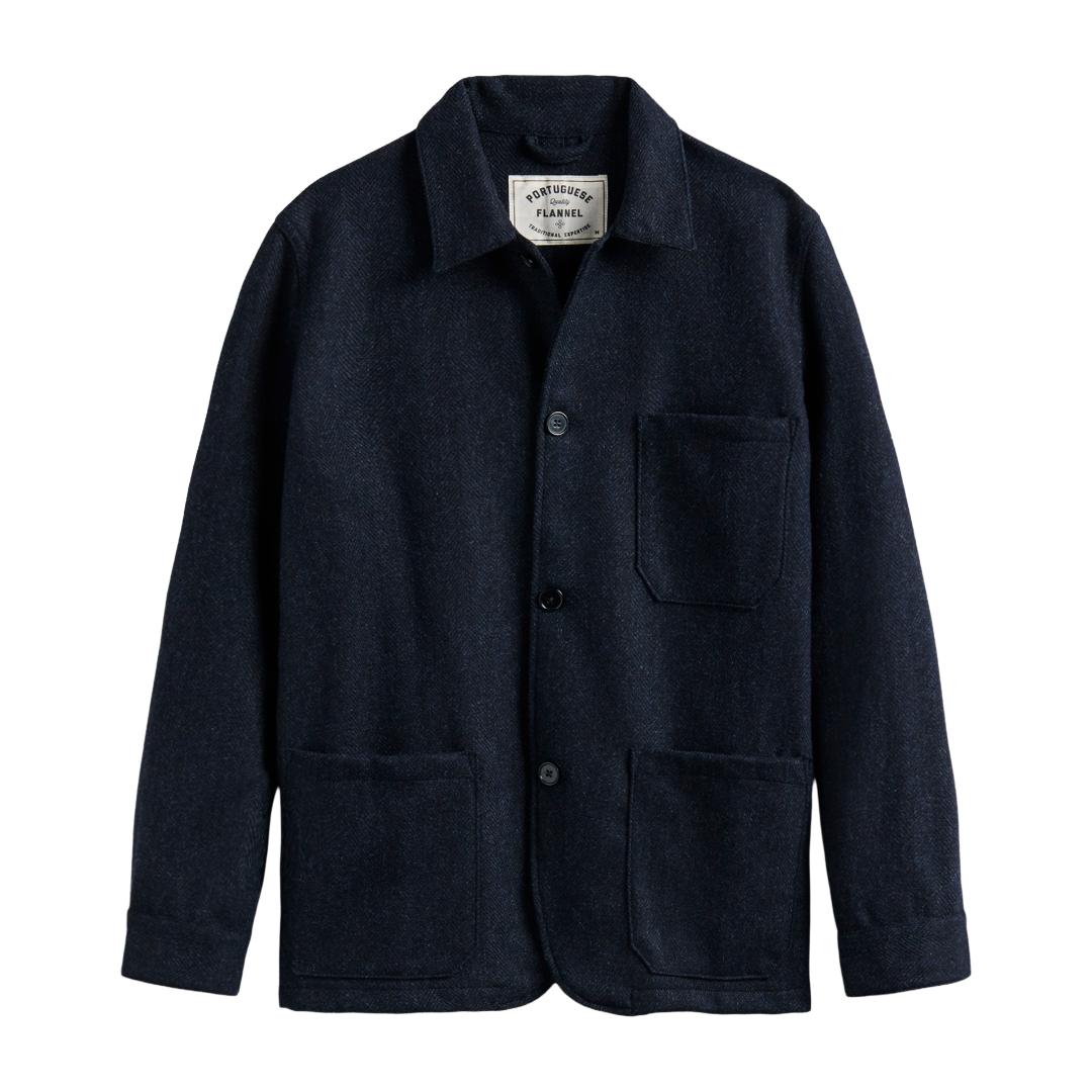 A dark navy blue wool work jacket with a button-up front, collar, chest pocket, and two large front patch pockets, shown flat against a white background.
