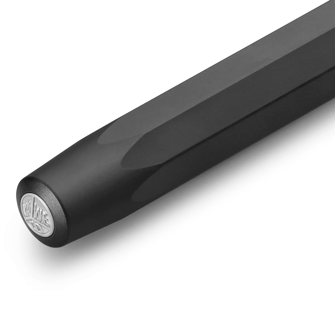 Close-up of a black cylindrical product, likely a handlebar grip or rod end, featuring a circular silver logo badge on the end cap, set against a clean white background.