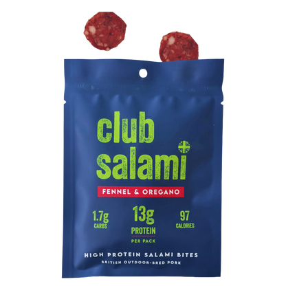 A blue stand-up pouch of Club Salami Fennel & Oregano protein salami bites, with two round salami slices floating above the package on a white background.