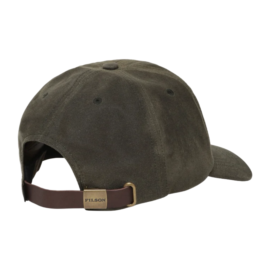 An olive green Filson baseball cap shown from a rear three-quarter angle, featuring a brown adjustable strap with a brass-tone metal buckle and a gold-toned metal brand plate.
