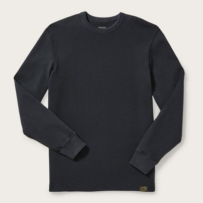 Black long-sleeve shirt on a light gray background