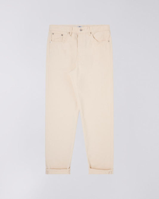 Natural rinsed, loose tapered jean with a mid rise waist and fly and button fastening.