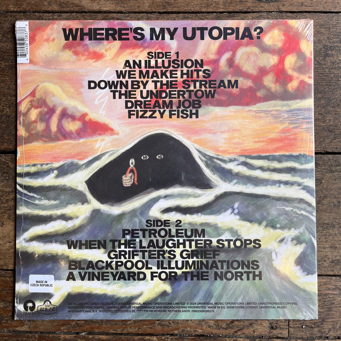 Back of Where’s my Utopia album stating the songs 