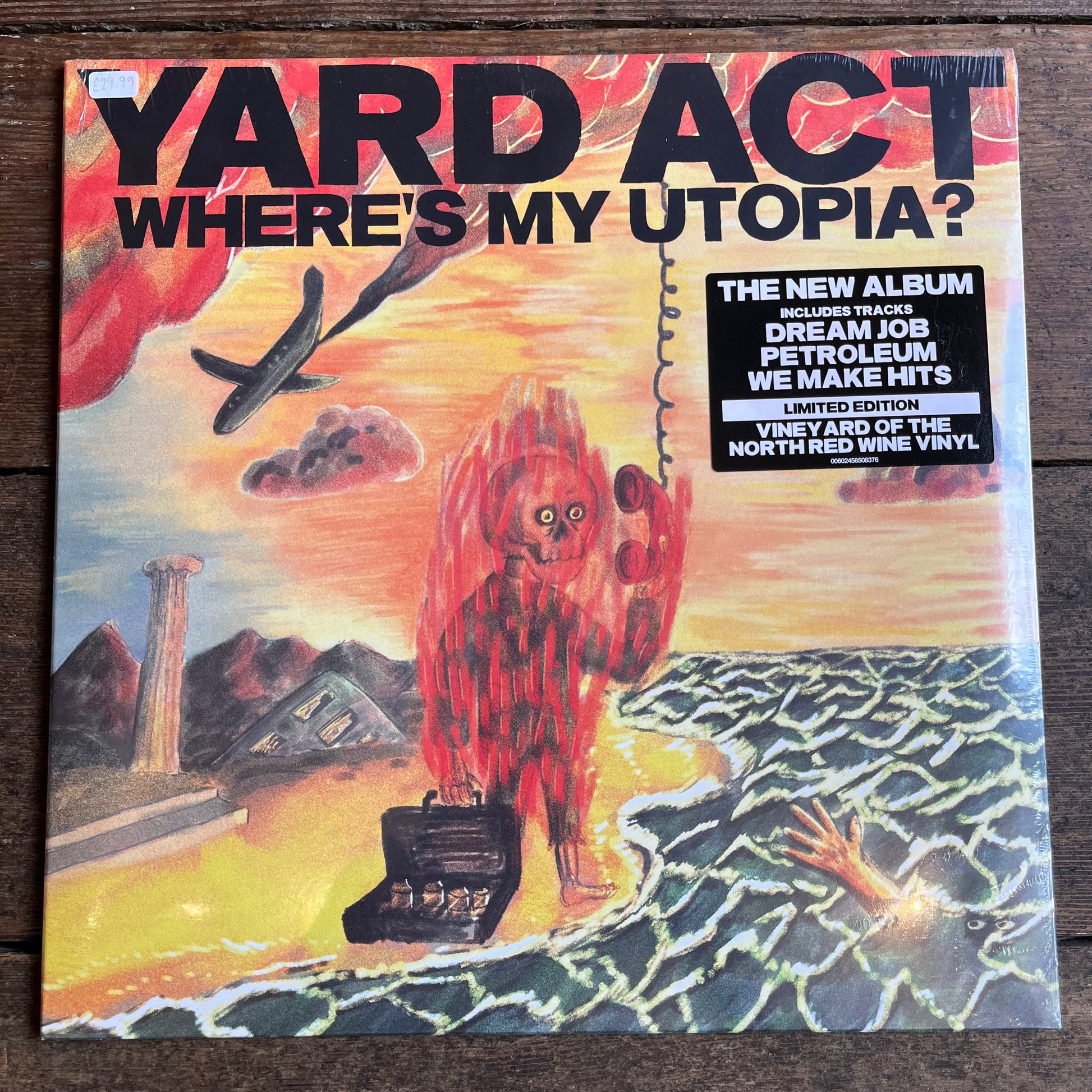 Yard Act- Where’s my utopia album on wooden background 