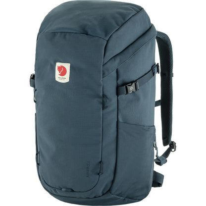 Side view of blue backpack sold at regent 