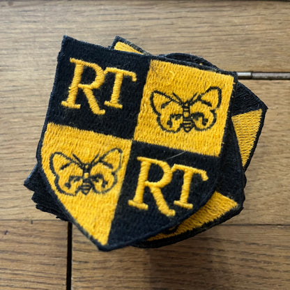 Yellow and black embroidered patch 