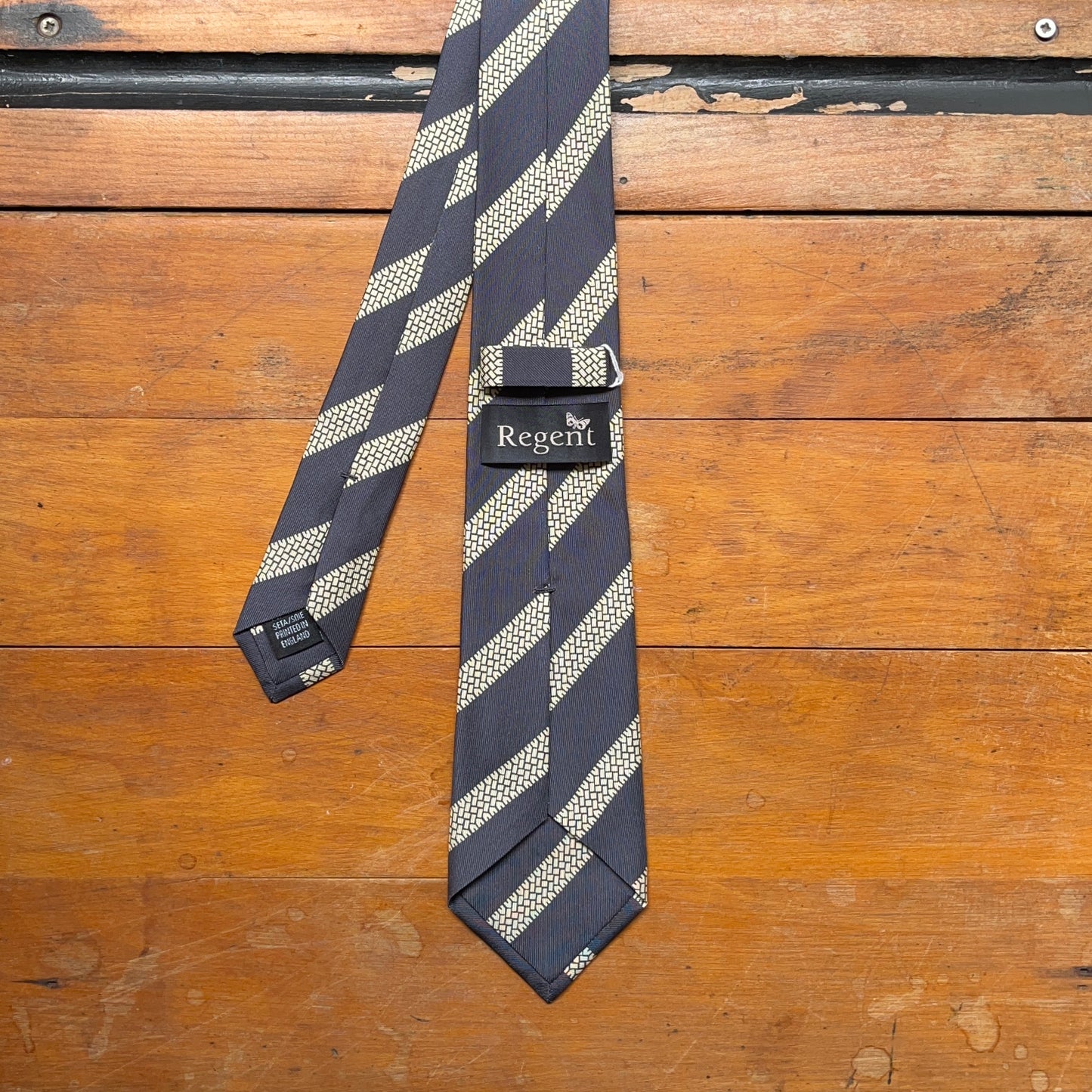 Regent - Woven Silk Tie - Slate Grey with Printed Motorbike Tread - reverse