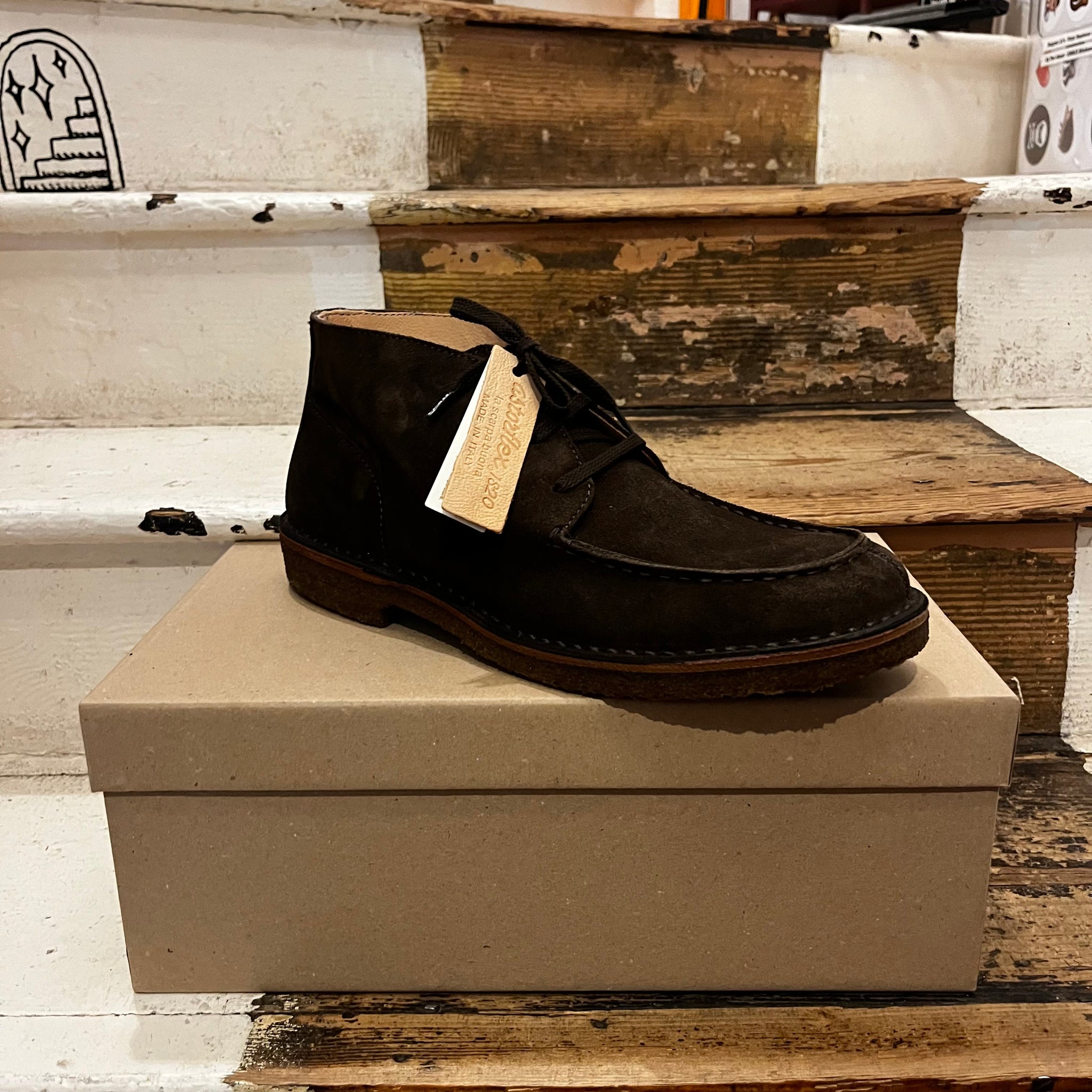 Astorflex brown chukka style sued shoe with a modernised moc-toe front.