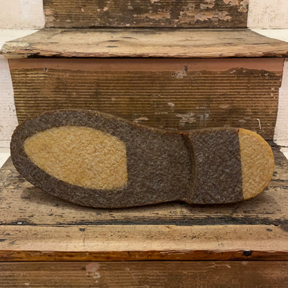 Sole of Astorflex Montflex mattone coloured suede desert boot on stairs