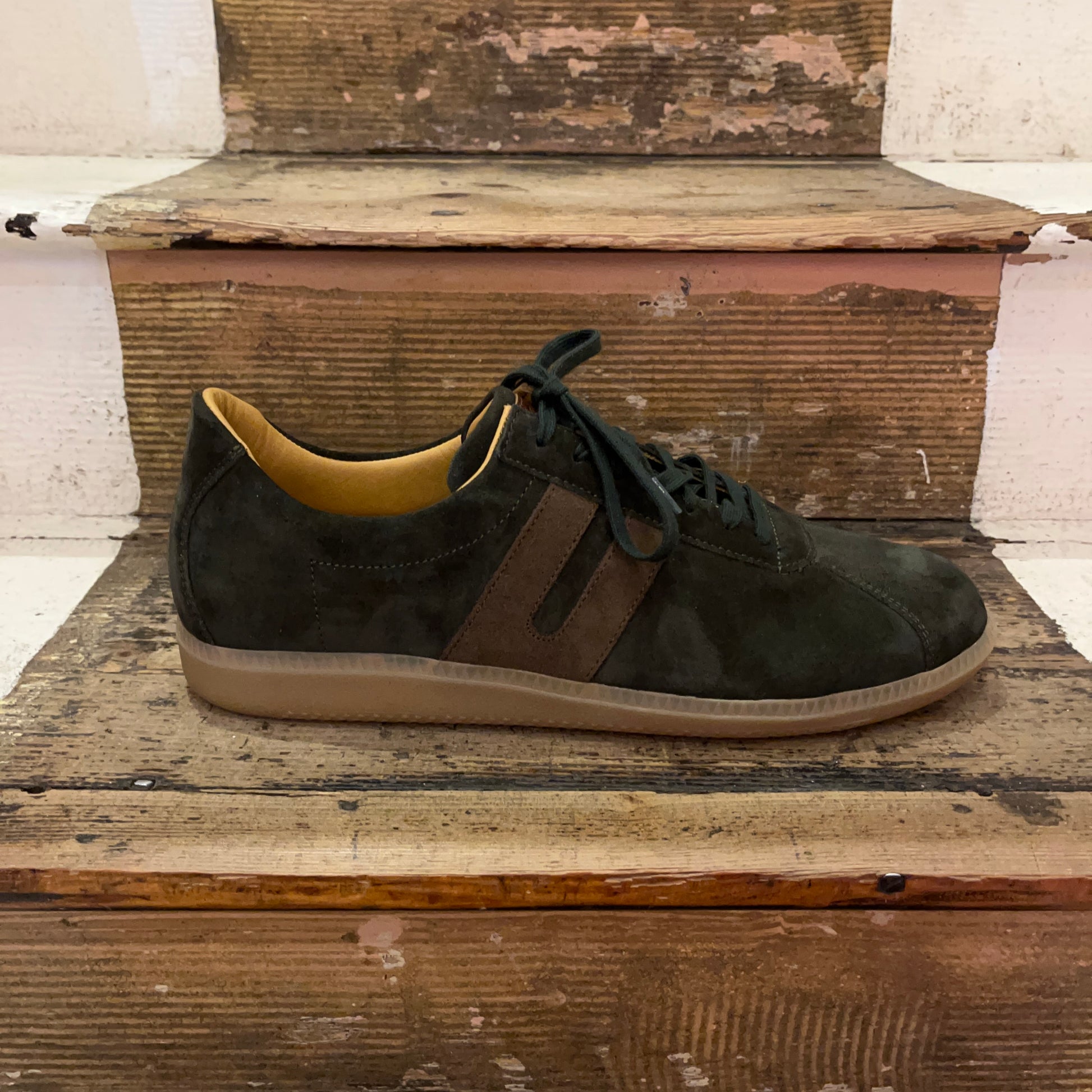 Ludwig Reiter green suede trainer on stairs