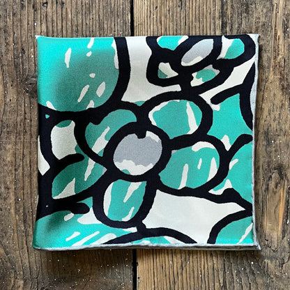 Silk pocket square with hand drawn green daisy design