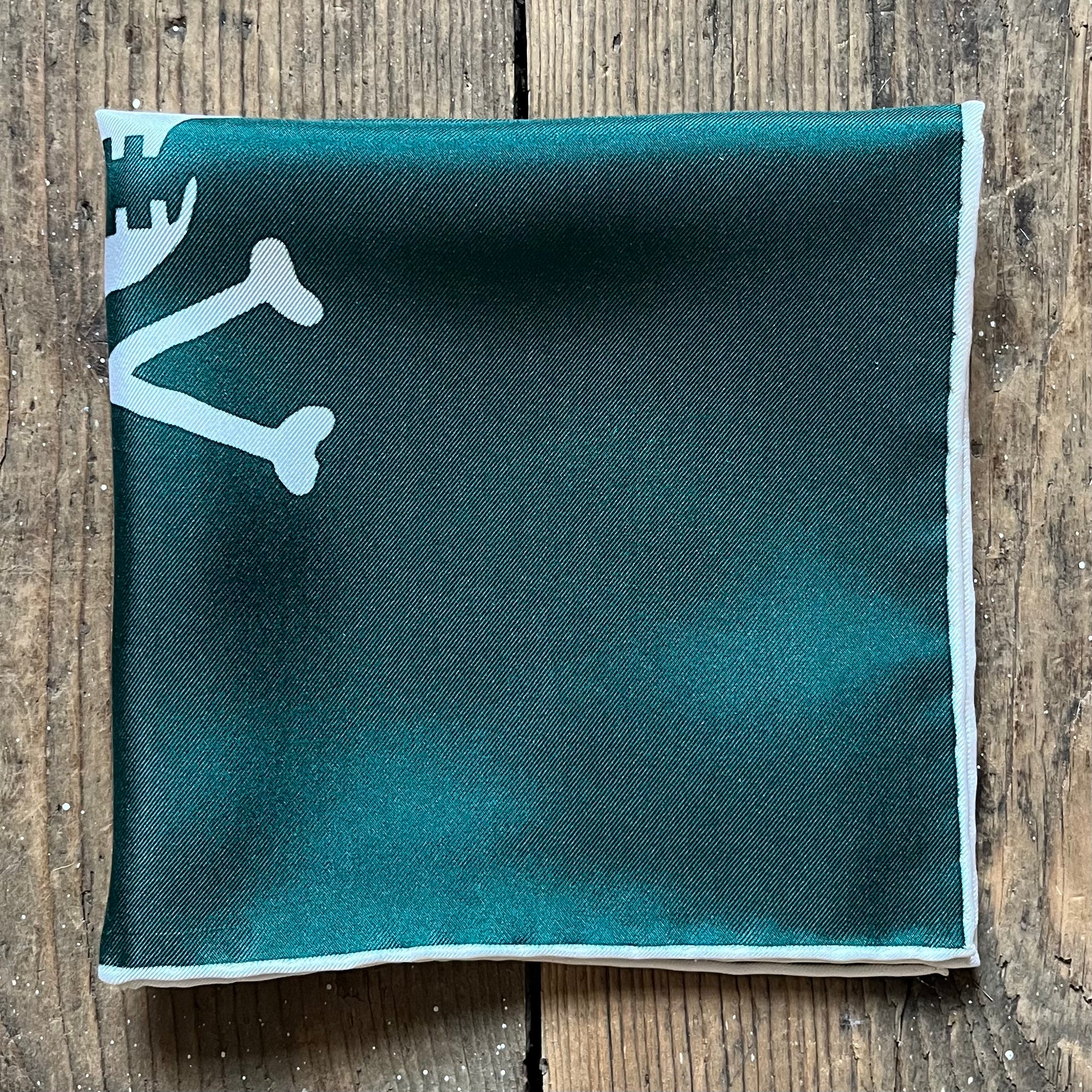 Racing green silk pocket square with Regent butterfly and skull logo